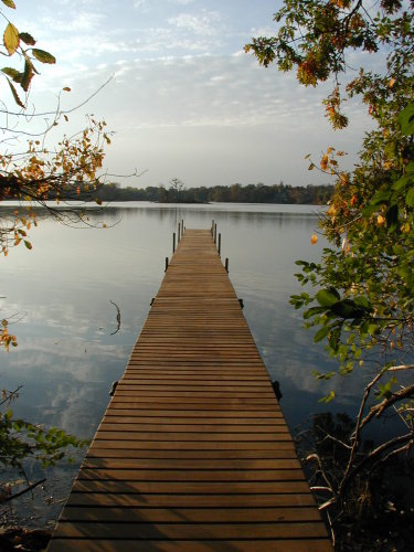 private dock and home on island lake michigan